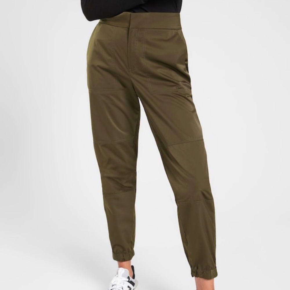 Athlete radiant jogger in olive